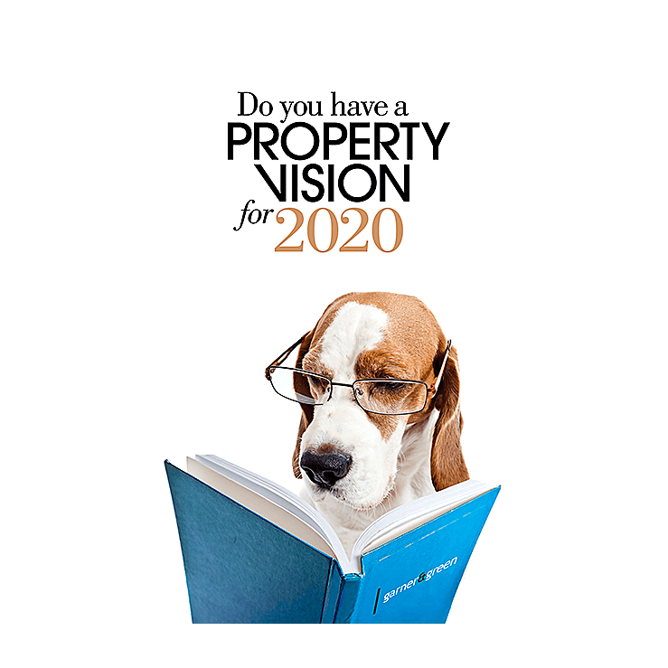 Dog with glasses reading a book