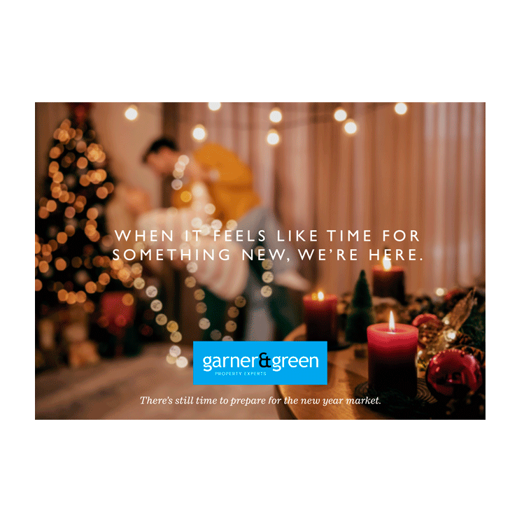 Cosy Christmas setting with blurred couple and festive decor
