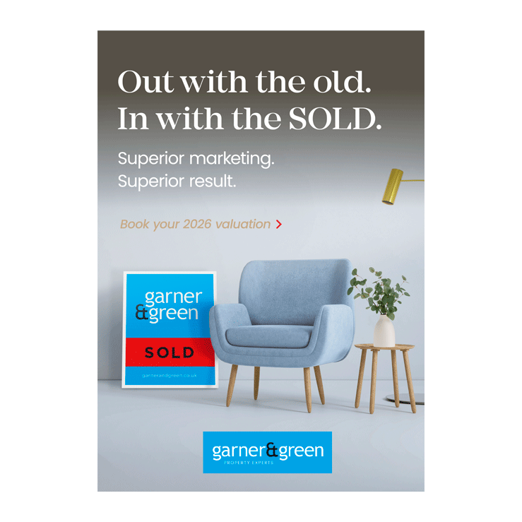 Minimalist room with blue armchair and SOLD board beside it