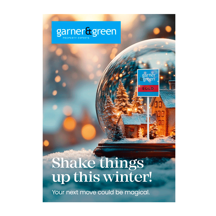 Snow globe scene with SOLD board and magical festive bokeh